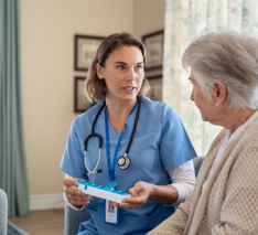 caregiver talking to senior