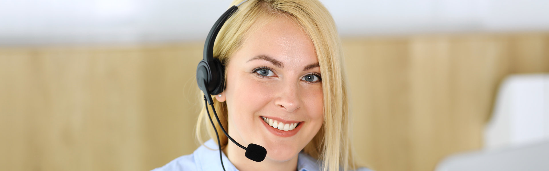 blonde woman with headset